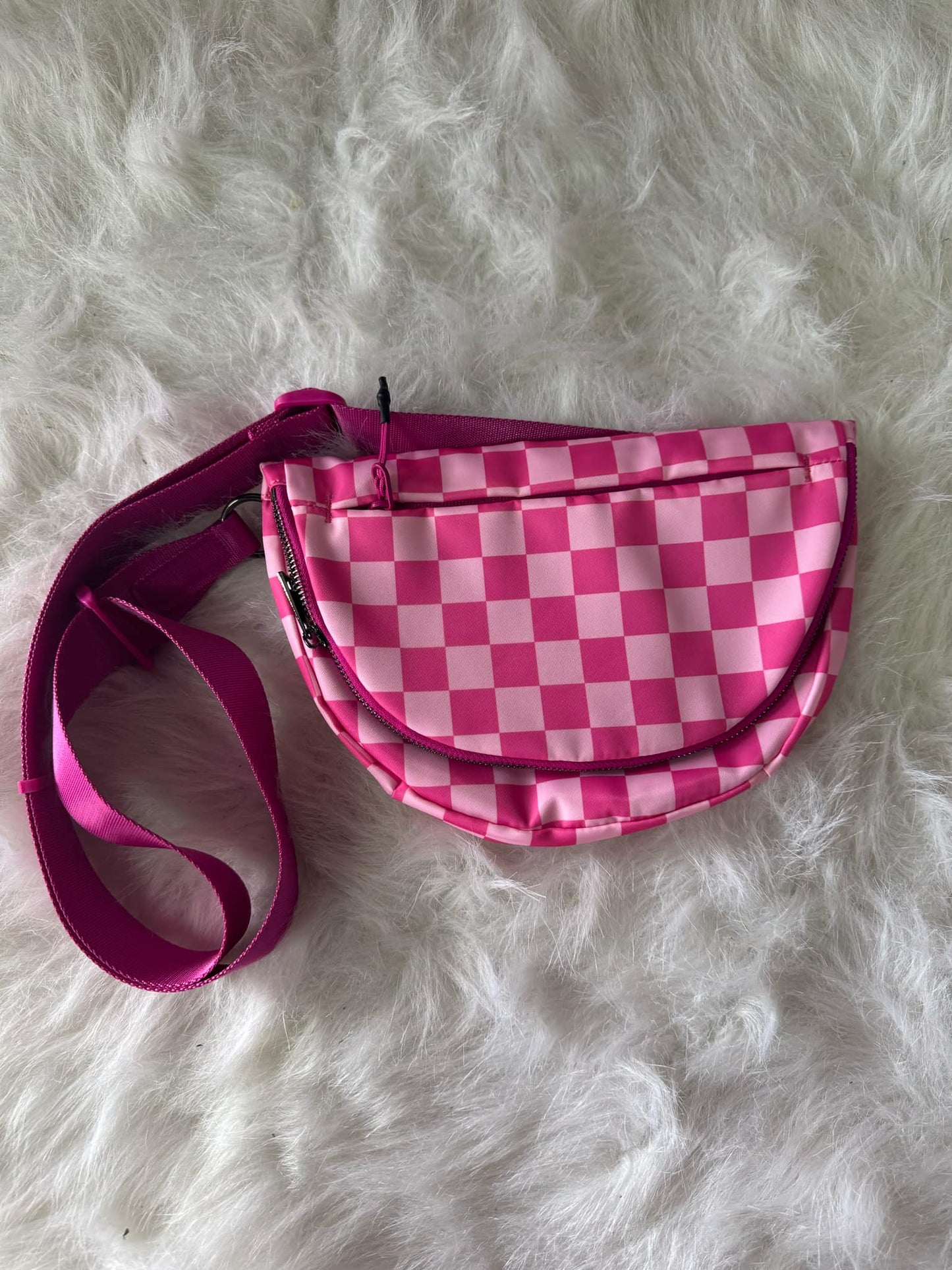 Checked back into pink bag